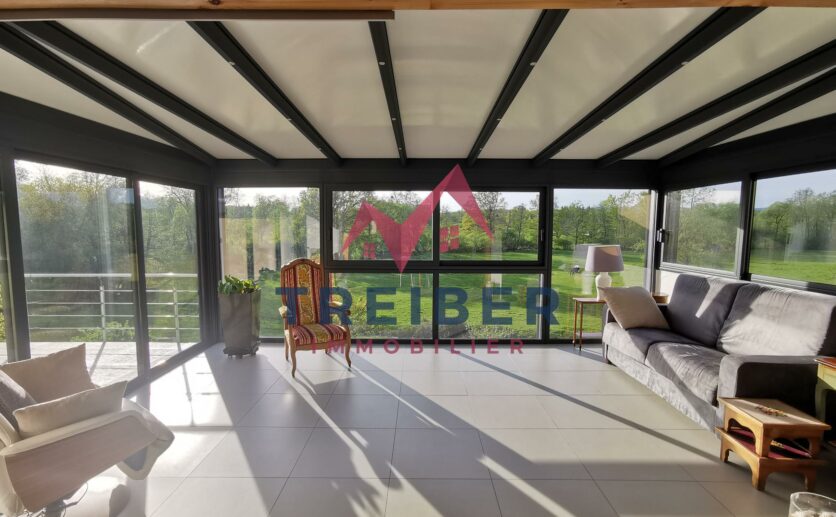 Maison Axe Belfort Lure sur sous sol avec magnifique véranda, terrasse attenante, double garage sur 12 ares de