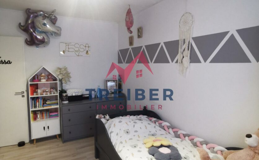 Maison de 13750 m2 à Ronchamp au calme avec garage et terrain privatif